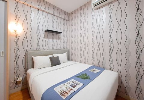Bedroom Simple 2BR near Cisauk Station at Serpong Garden Apartment By Travelio