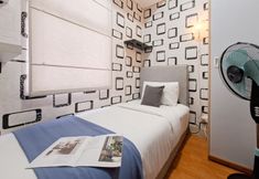 Bedroom 2 Simple 2BR near Cisauk Station at Serpong Garden Apartment By Travelio