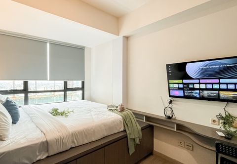 Phòng ngủ Best Studio near Grand Serpong Mall at Apartment Collins Boulevard By Travelio