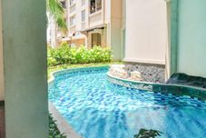 Swimming Pool Modern and Cozy 2BR Apartment Marina Ancol By Travelio