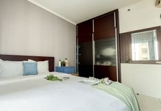 Bedroom 2 Modern and Cozy 2BR Apartment Marina Ancol By Travelio