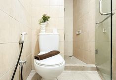 In-room Bathroom 7 Modern and Cozy 2BR Apartment Marina Ancol By Travelio