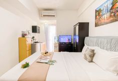 Bedroom 3 Tidy and Basic Studio near Station at Margonda Residence 2 Apartment By Travelio