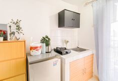 Common Space 5 Tidy and Basic Studio near Station at Margonda Residence 2 Apartment By Travelio
