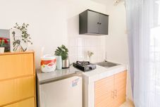 Common Space Tidy and Basic Studio near Station at Margonda Residence 2 Apartment By Travelio