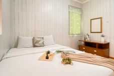 Phòng ngủ Functional and Compact 3BR Apartment Grand Palace Kemayoran By Travelio