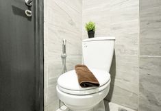 객실 내 욕실 6 Comfy Ivory Studio at Collins Boulevard Apartment By Travelio