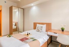 Others 4 Cream Tone and Nice Studio at Evenciio Margonda Apartment By Travelio