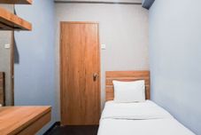 Phòng ngủ Well Furnished 2BR at Suites @Metro Apartment By Travelio