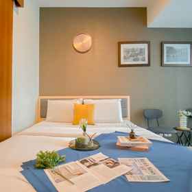 Bedroom 1 Cozy Stay and Enjoy 1BR at Apartment Grand Kamala Lagoon By Travelio, Bekasi Hotels