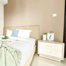 Bedroom 1 Relaxing and Spacious 2BR at Apartment Casa de Parco By Travelio , Hotel Klinik Polres Metro Tangerang Selatan