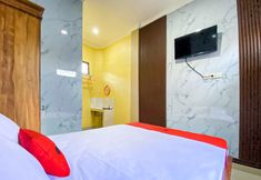Bedroom 3 RedDoorz Syariah Permata Inn near Alun-Alun Cilacap