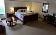 Bedroom 6 Ramada Hotel & Conference Center by Wyndham Greensburg
