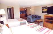 ห้องนอน 2 Coachman Inn & Suites