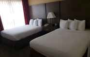 Bedroom 2 Affordable Suites of America Detroit-Warren