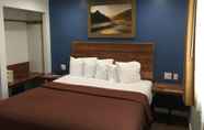 Kamar Tidur 6 Days Inn & Suites by Wyndham San Diego SDSU