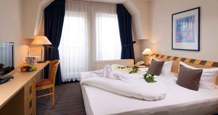 Phòng ngủ ACHAT Hotel Dresden Elbufer