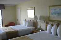 Phòng ngủ Days Inn by Wyndham Daytona Oceanfront