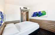 Kamar Tidur 3 H+ Hotel Frankfurt Airport West