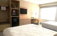 ห้องนอน 6 Days Inn & Suites by Wyndham Duluth by the Mall