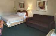 Bedroom 2 Days Inn by Wyndham Lake Park/Valdosta