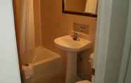In-room Bathroom 6 Magnuson Hotel Ely