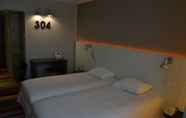 Bedroom 4 ibis Styles Lyon Sud Vienne