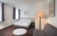 Phòng ngủ 5 Days Inn by Wyndham Kassel Hessenland