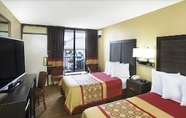 Bedroom 4 Days Inn by Wyndham Columbus-North Fort Benning