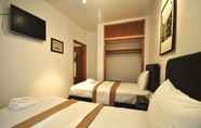ห้องนอน 2 Off Soho Suites Hotel
