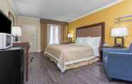 Bedroom 6 Days Inn by Wyndham Pensacola - Historic Downtown