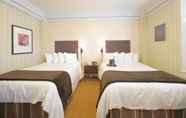 Kamar Tidur 7 Executive Hotel Vintage Court