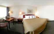 Bedroom 4 Rodeway Inn Conference Center
