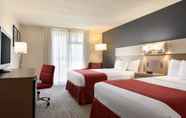 Bedroom 6 Ramada by Wyndham Clarion