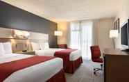 Bedroom 6 Ramada by Wyndham Clarion