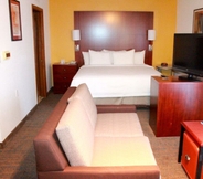 Bedroom 6 SenS Suites Livermore, SureStay Collection by Best Western