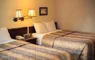 Bedroom 4 Langley Hwy Hotel