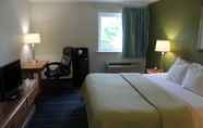 Bedroom 3 Days Inn & Suites by Wyndham Bridgeport - Clarksburg