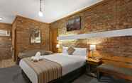 Kamar Tidur 4 The Settlement Historic Hotel