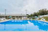 Swimming Pool Ramada by Wyndham State College Hotel & Conference Center