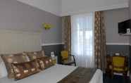 Kamar Tidur 6 Best Western Hotel de France Angleterre et Champla