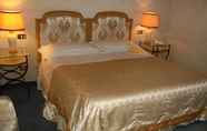 Bedroom 2 Grand Hotel Croce di Malta Wellness & Golf