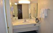 In-room Bathroom 5 Magnuson Hotel Texarkana