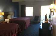 ห้องนอน 6 Days Inn by Wyndham Ocala North