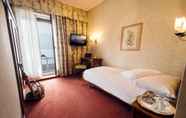 Kamar Tidur 7 International au Lac Historic Lakeside Hotel