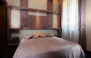 Bedroom 6 Hotel Abbazia