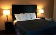 Bedroom 4 Americas Best Value Inn Romulus Detroit Airport