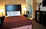 Bedroom 7 Americas Best Value Inn Romulus Detroit Airport