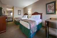 ห้องนอน Days Inn & Suites by Wyndham Warner Robins Near Robins AFB