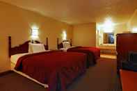 Bedroom Super 6 Inn & Suites